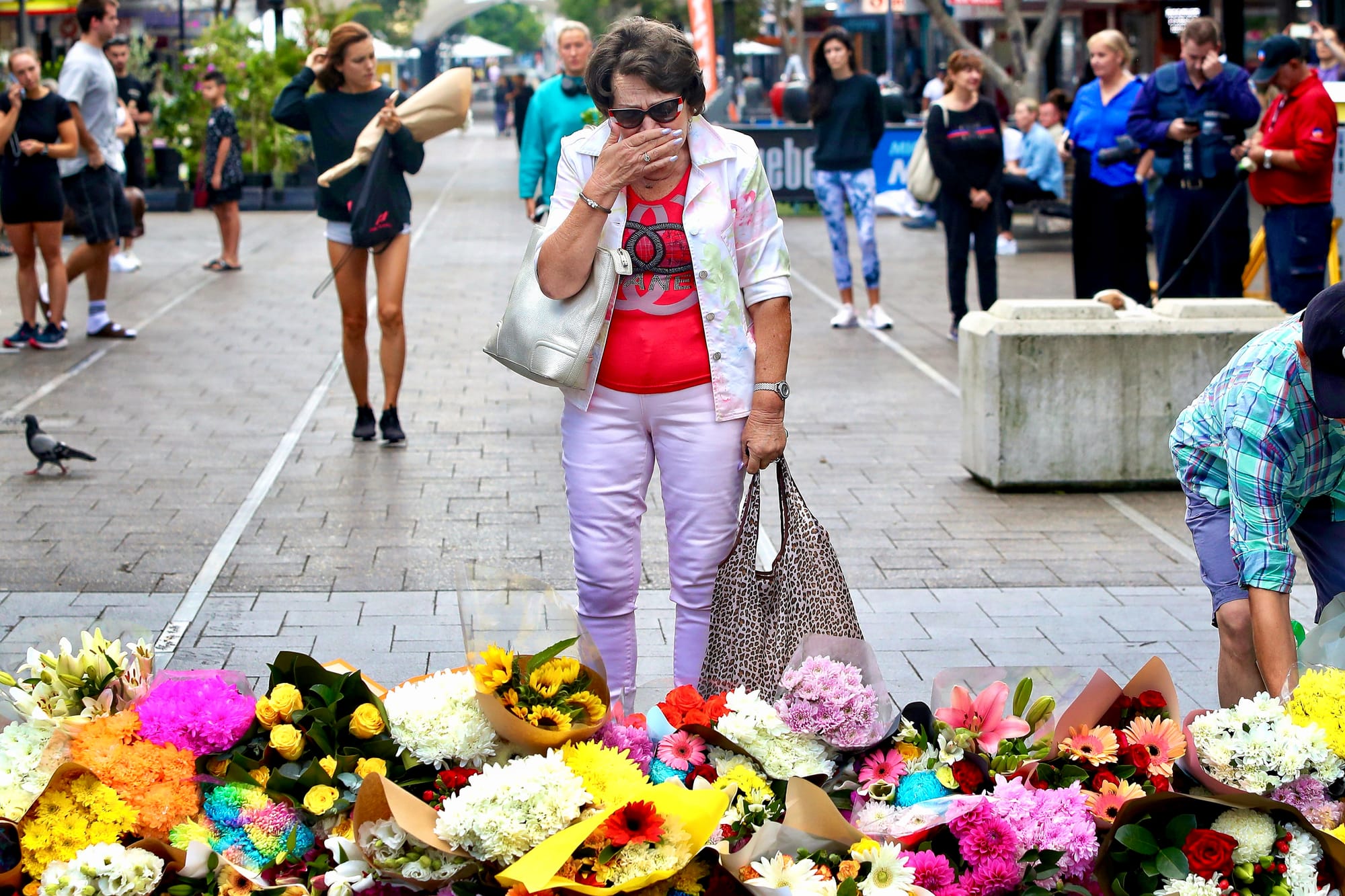 sydney mall stabbing memorial crying