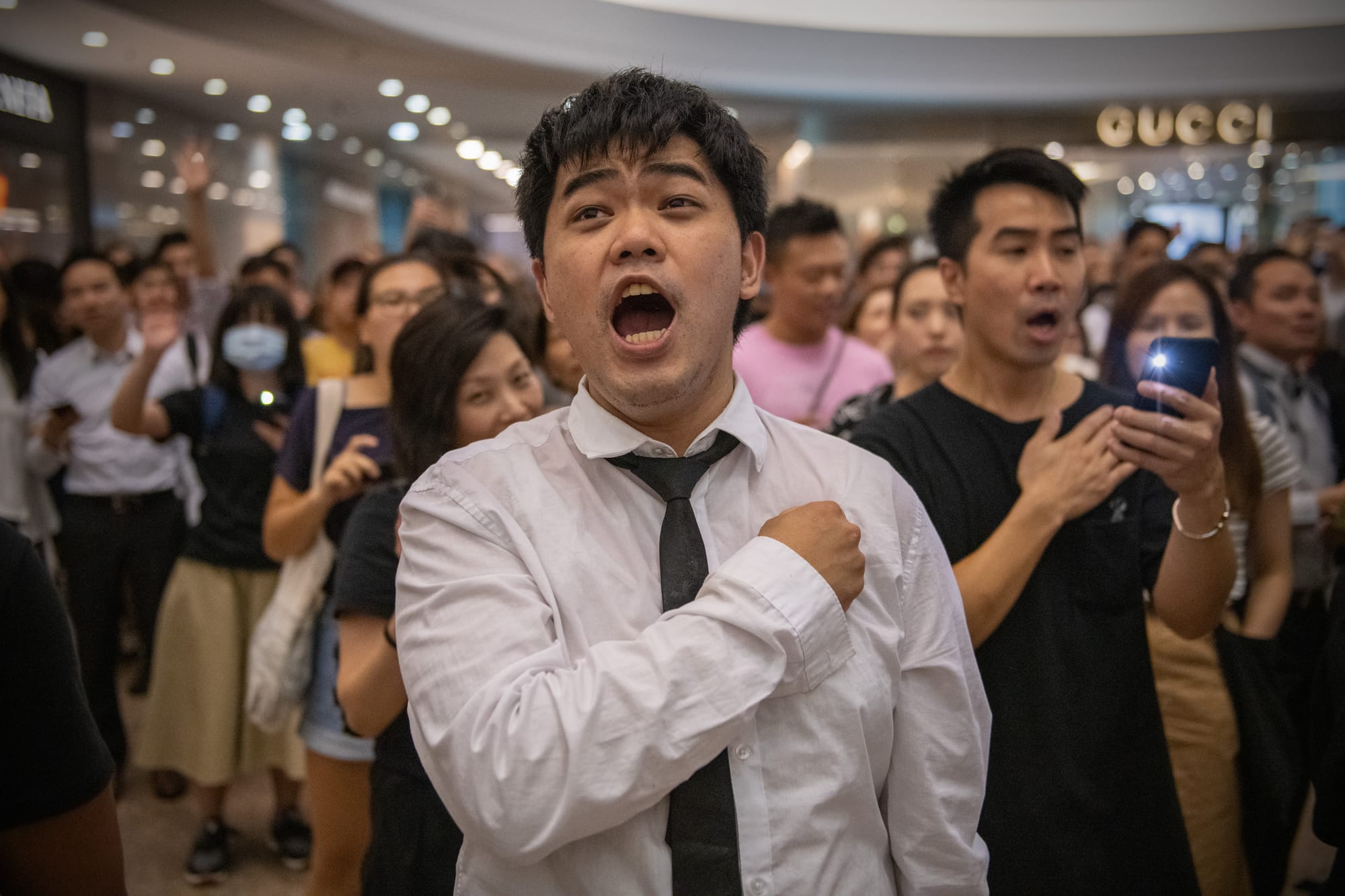 hong kong protester glory to hong kong anthem