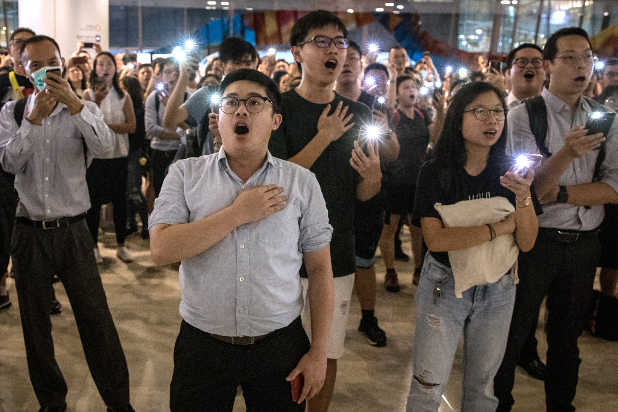 hong kong protesters sing glory to hong kong anthem song