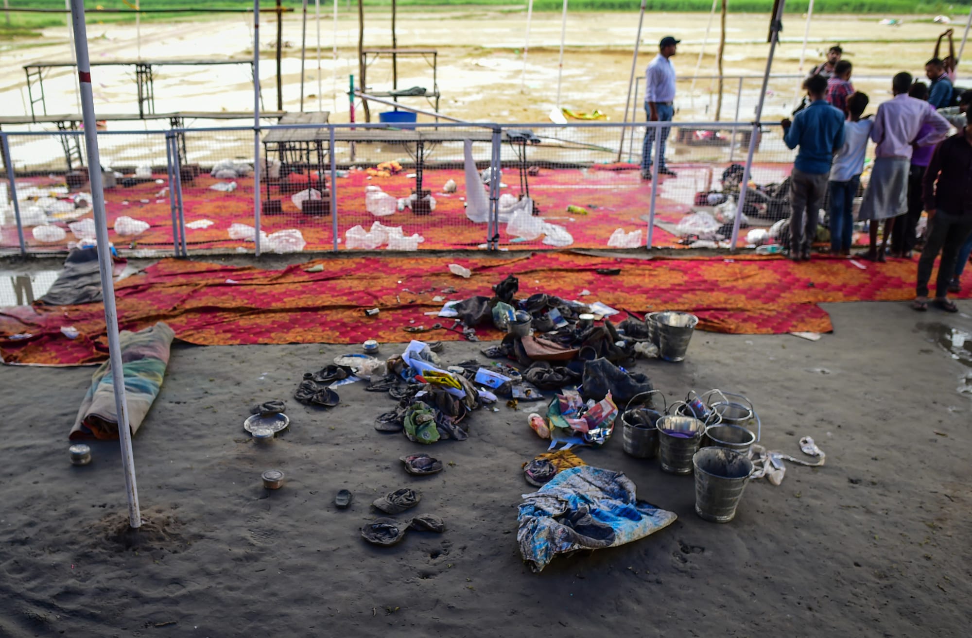 india hathras religious stampede aftermath clothes shoes