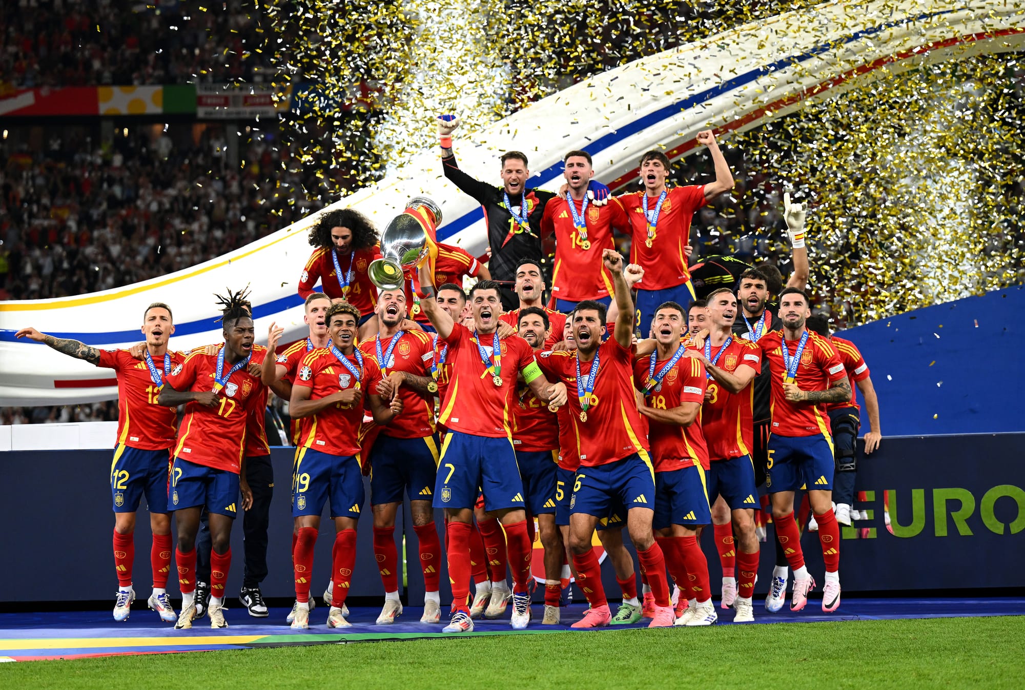 Alvaro Morata of Spain lifts the UEFA Euro 2024 Henri Delaunay Trophy