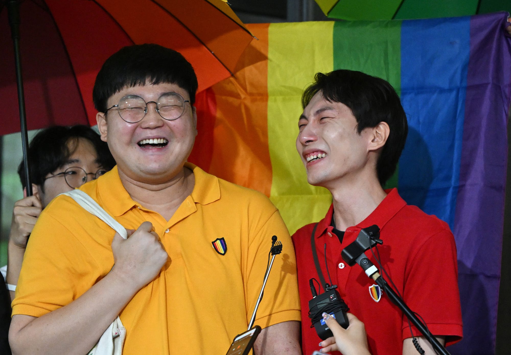 South Korean same-sex couple So Seong-wook (L) and Kim Yong-min