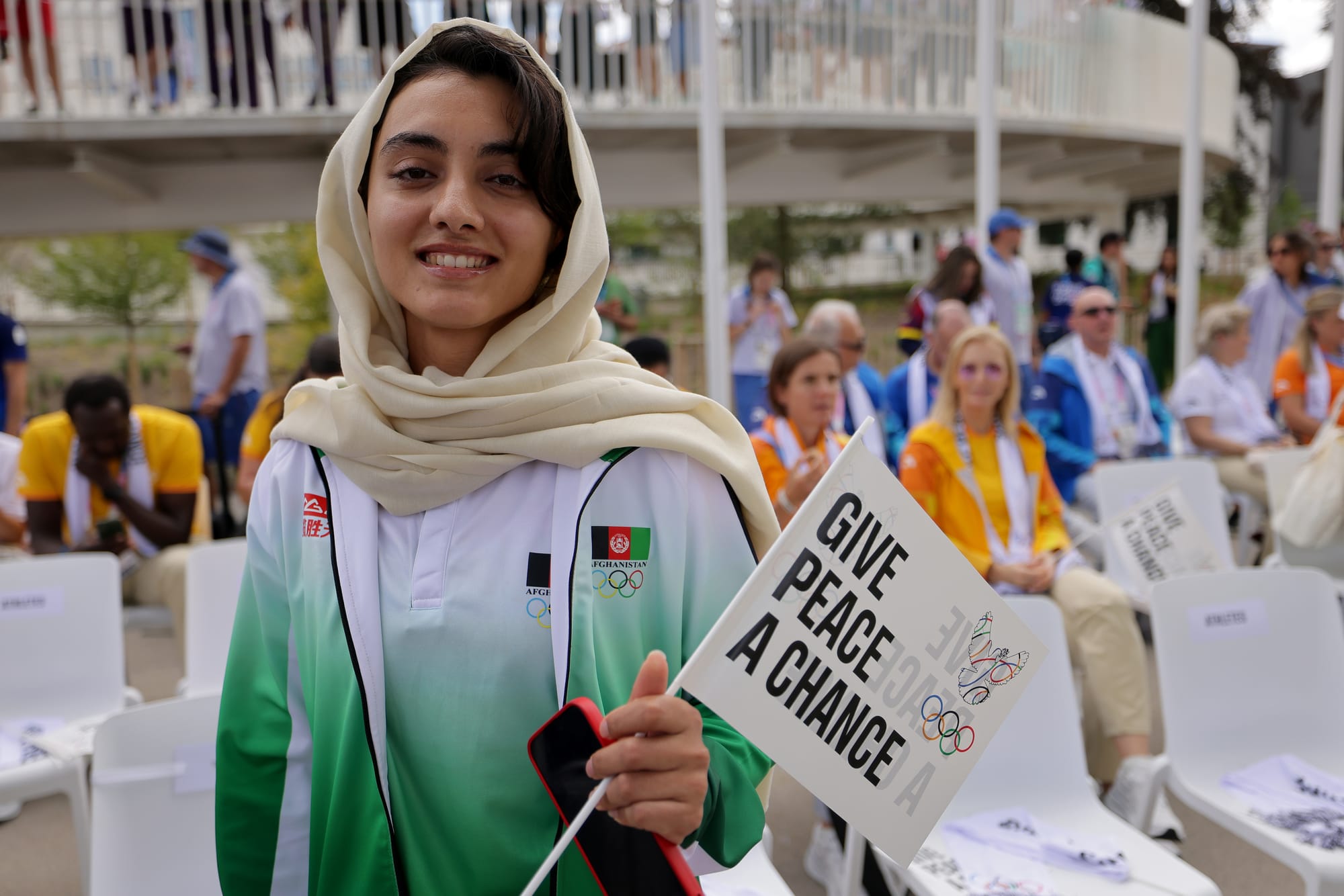 afghan woman athlete taliban message olympics kimia yousofi