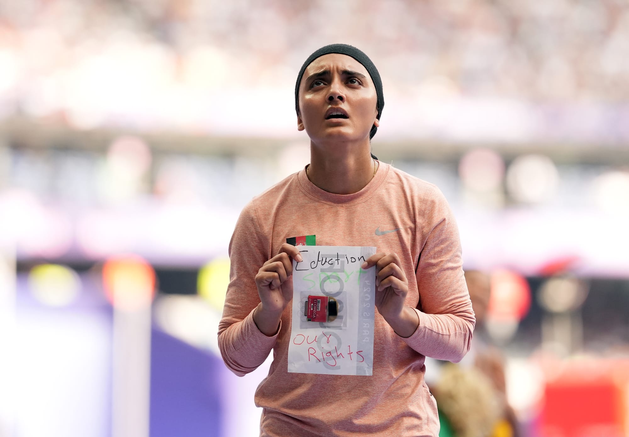 afghan woman athlete taliban message olympics kimia yousofi