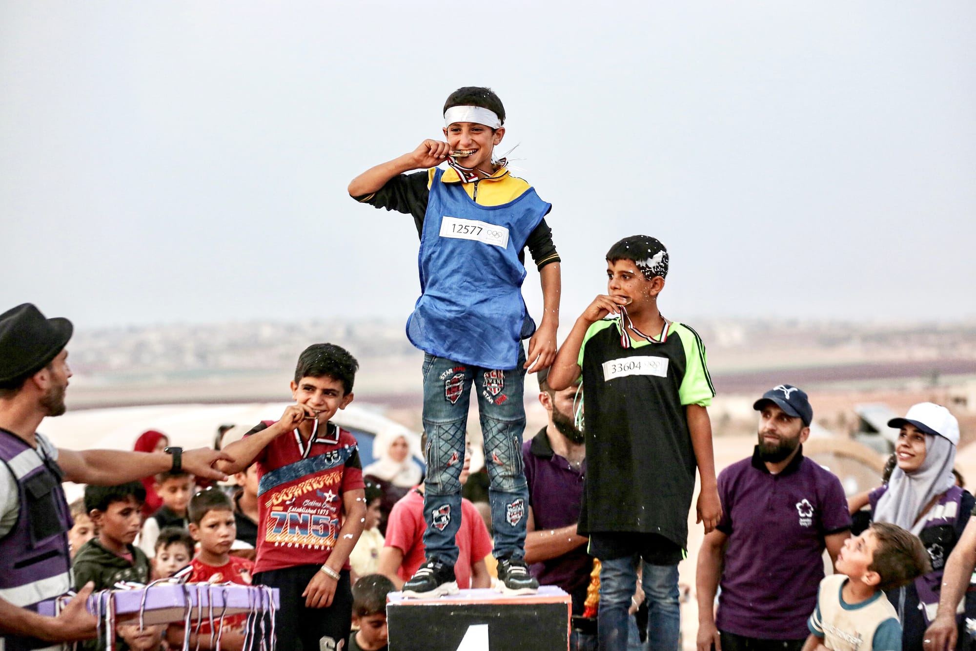 syrian children olympics tent idlib displaced