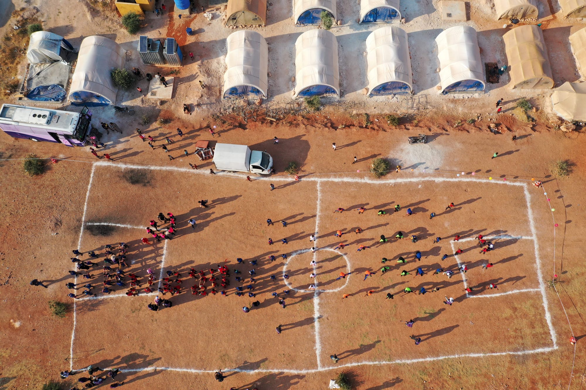 syrian children olympics tent idlib displaced