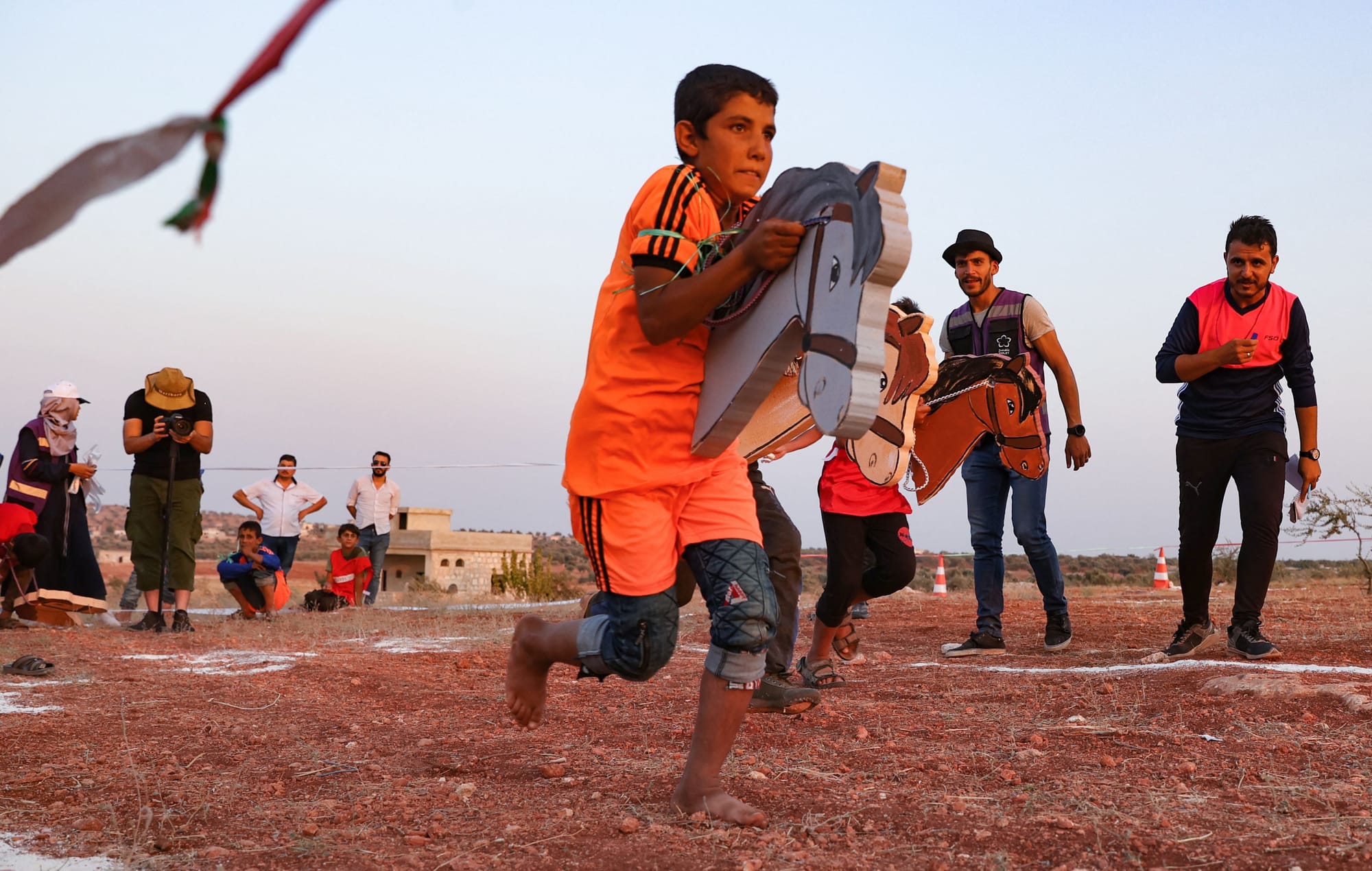 syrian children olympics tent idlib displaced