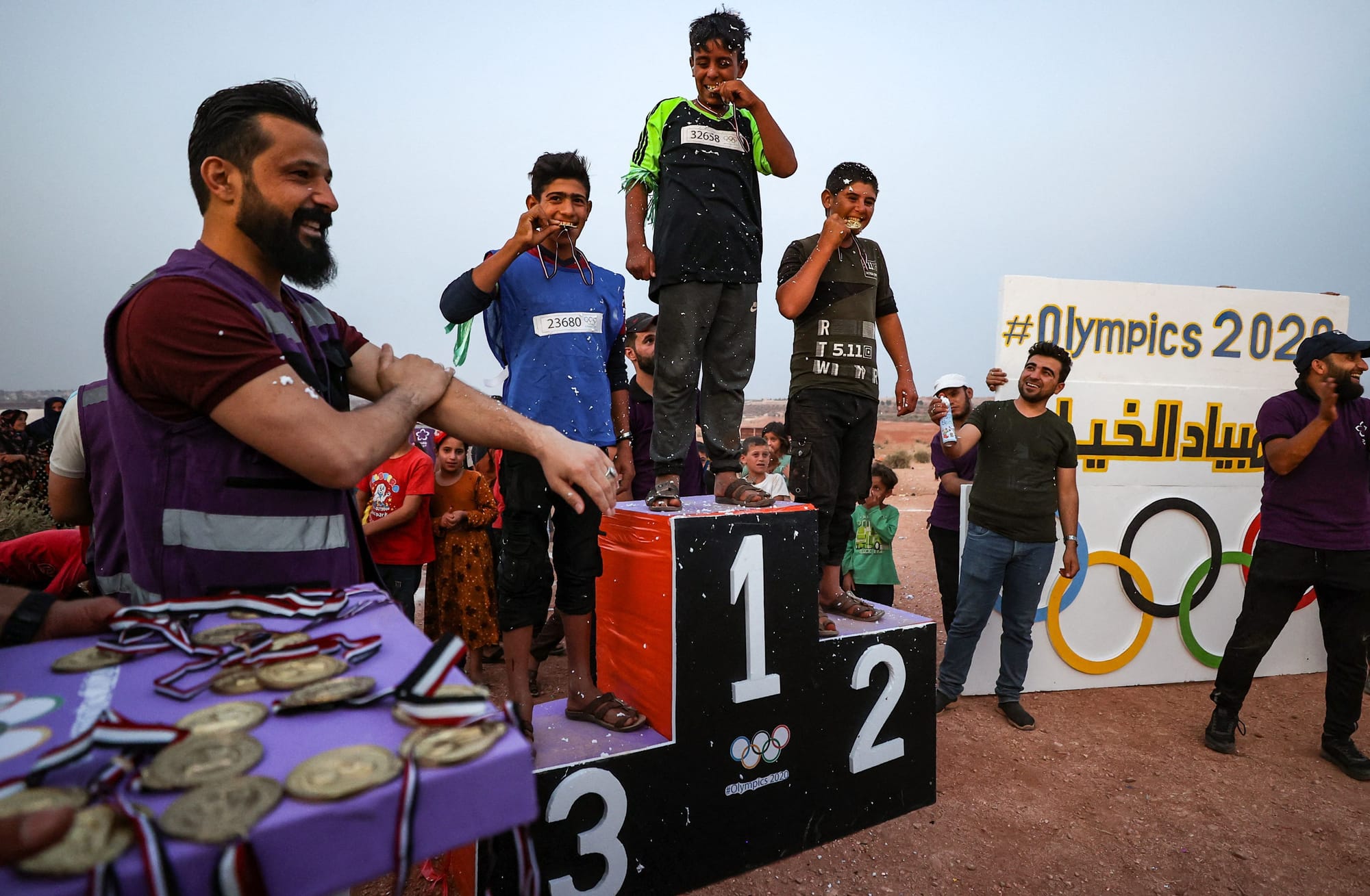 syrian children olympics tent idlib displaced