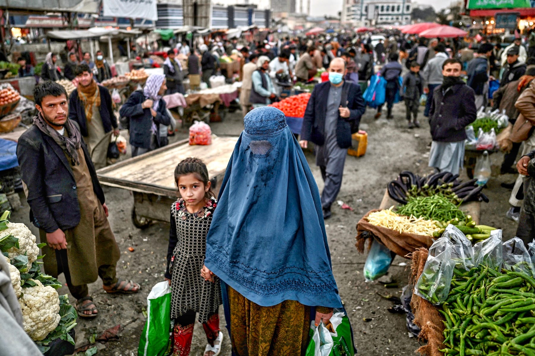 taliban bans women showing faces