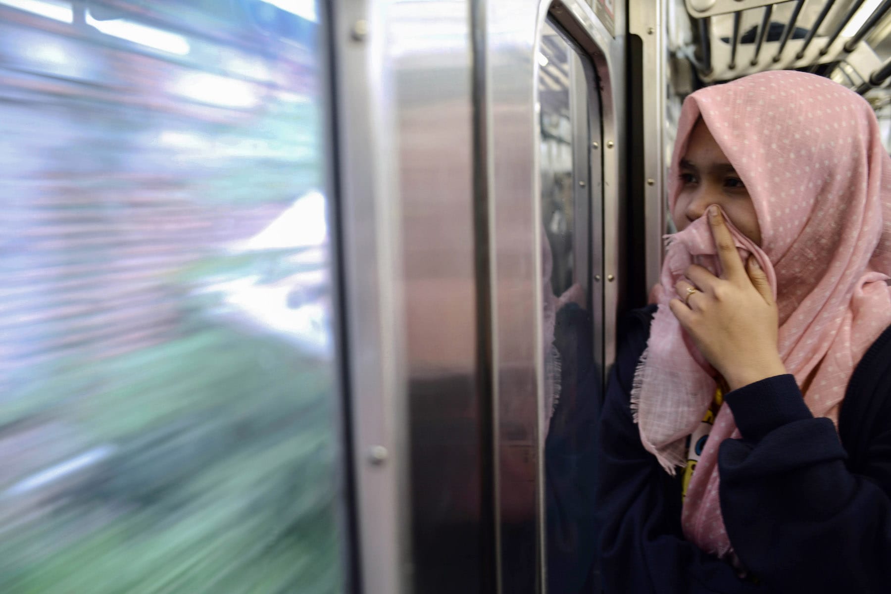 female passenger on train in indonesia