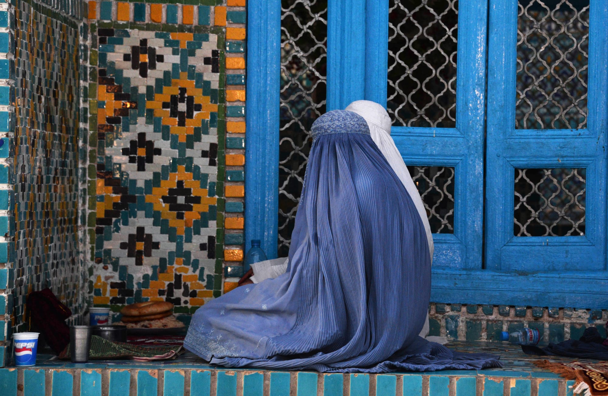 taliban ban women hearing each other afghanistan praying quran