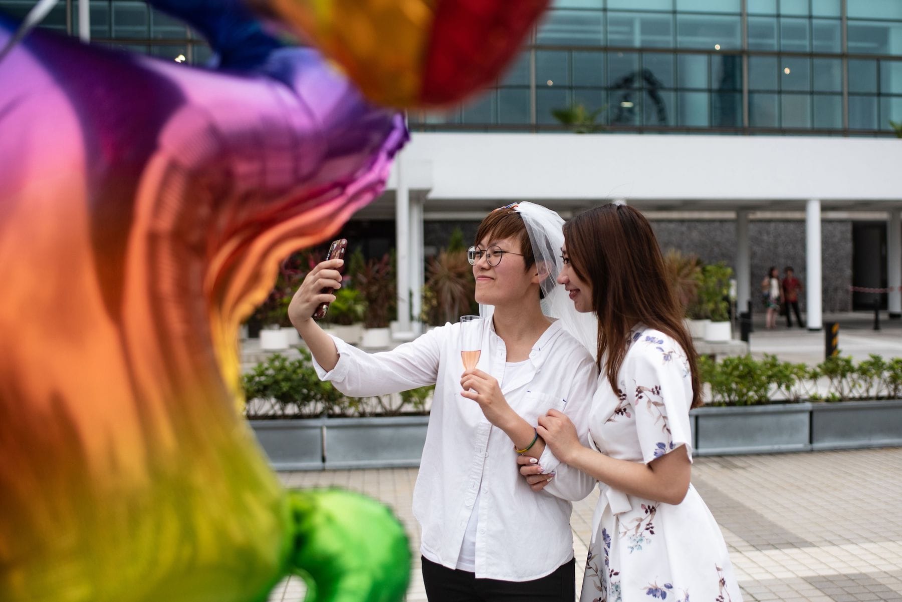 Same-sex couple take a selfie in Hong Kong