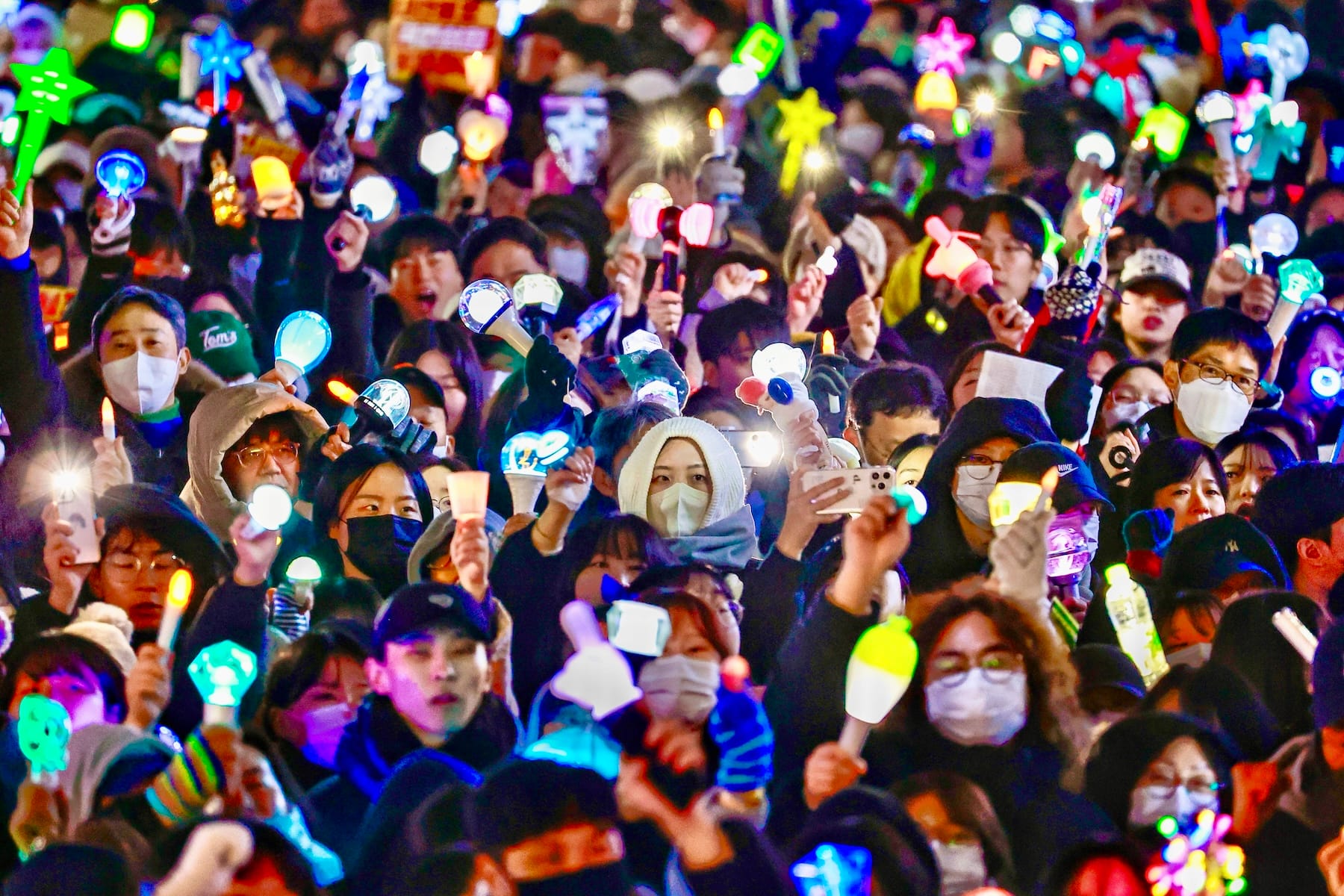 south korea martial law protest kpop light sticks young people