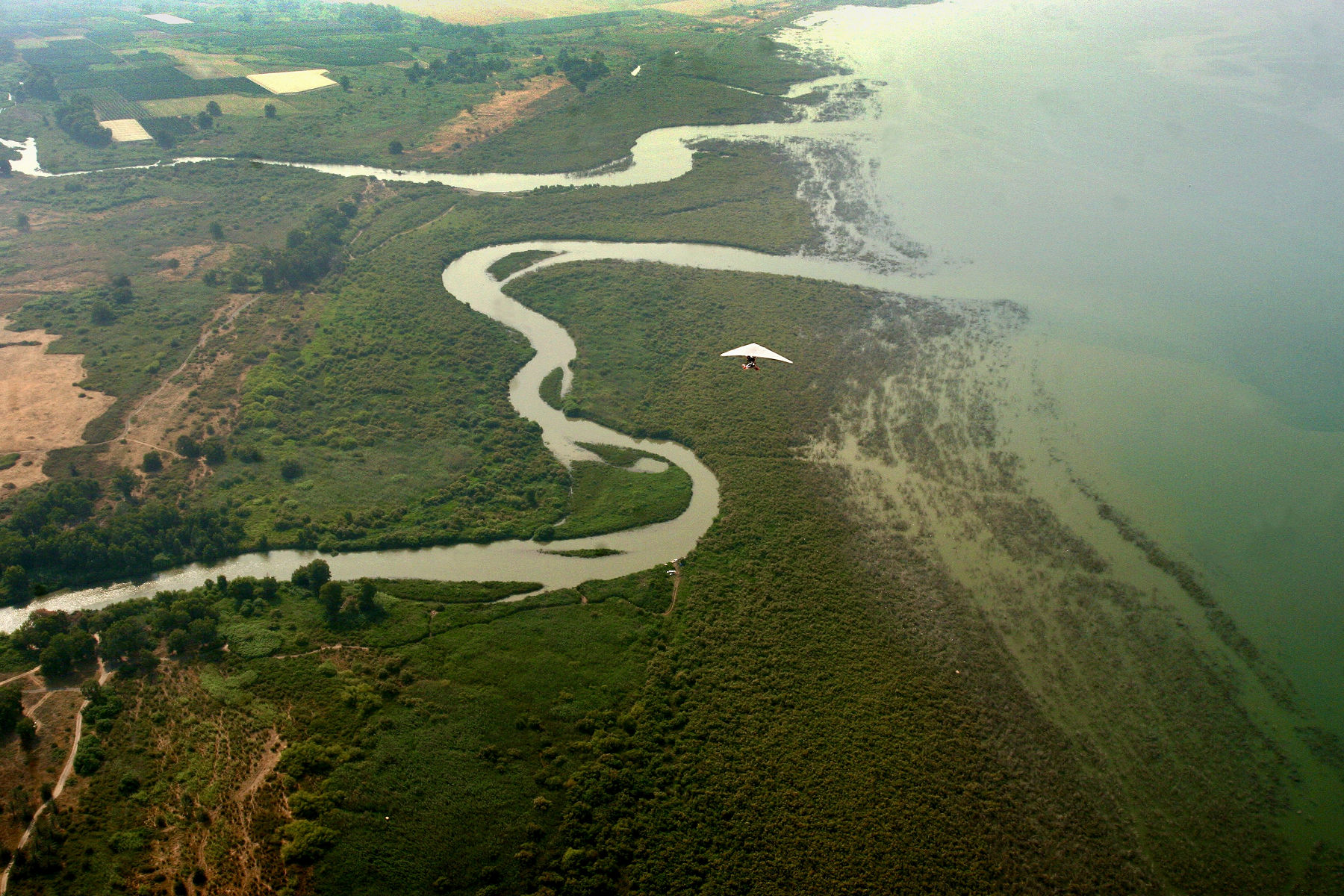 the Golan Heights where the Jordan River empties into the Sea of Galilee Syria Israel