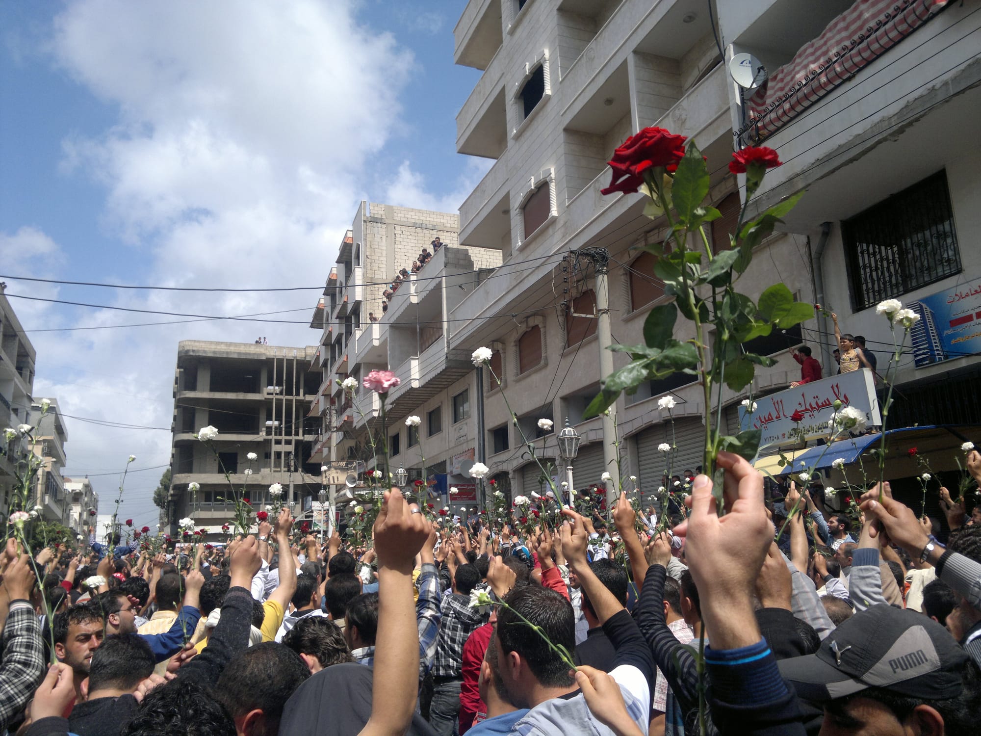 syria revolution flowers protest assad