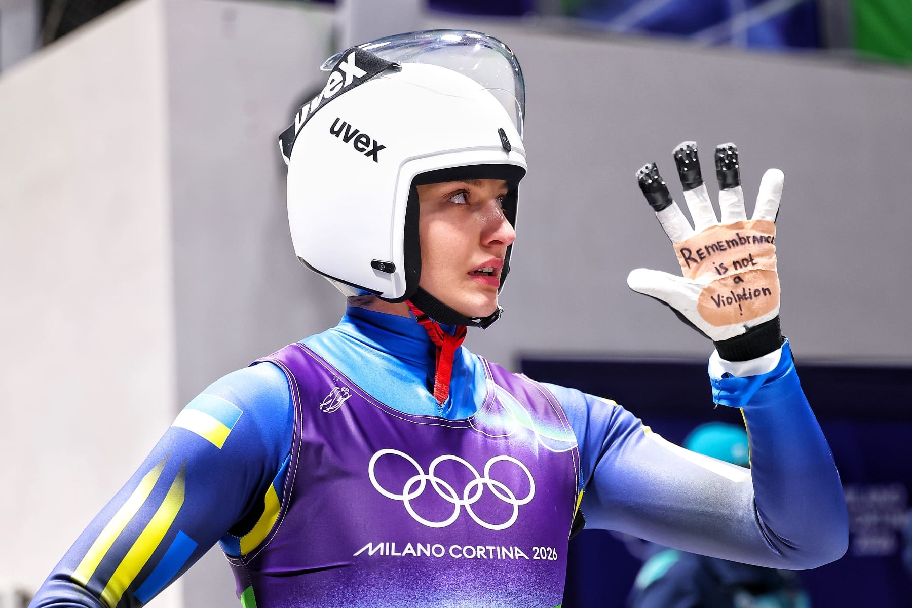 olena smaha ukraine milan olympics remembrance violation helmet