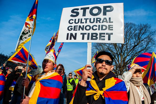 china ethnic unity law erase minorities uyghurs tibetans