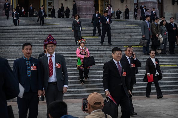 china ethnic unity law erase minorities uyghurs tibetans