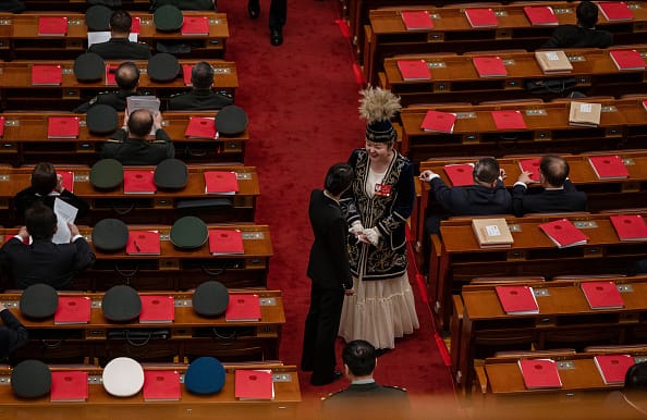 china ethnic unity law erase minorities uyghurs tibetans