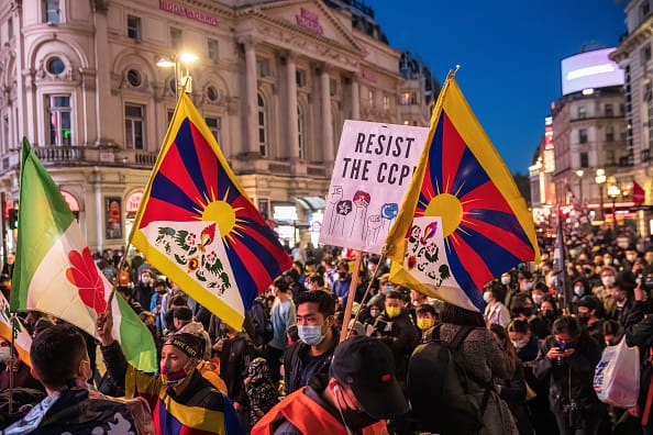 china ethnic unity law erase minorities uyghurs tibetans