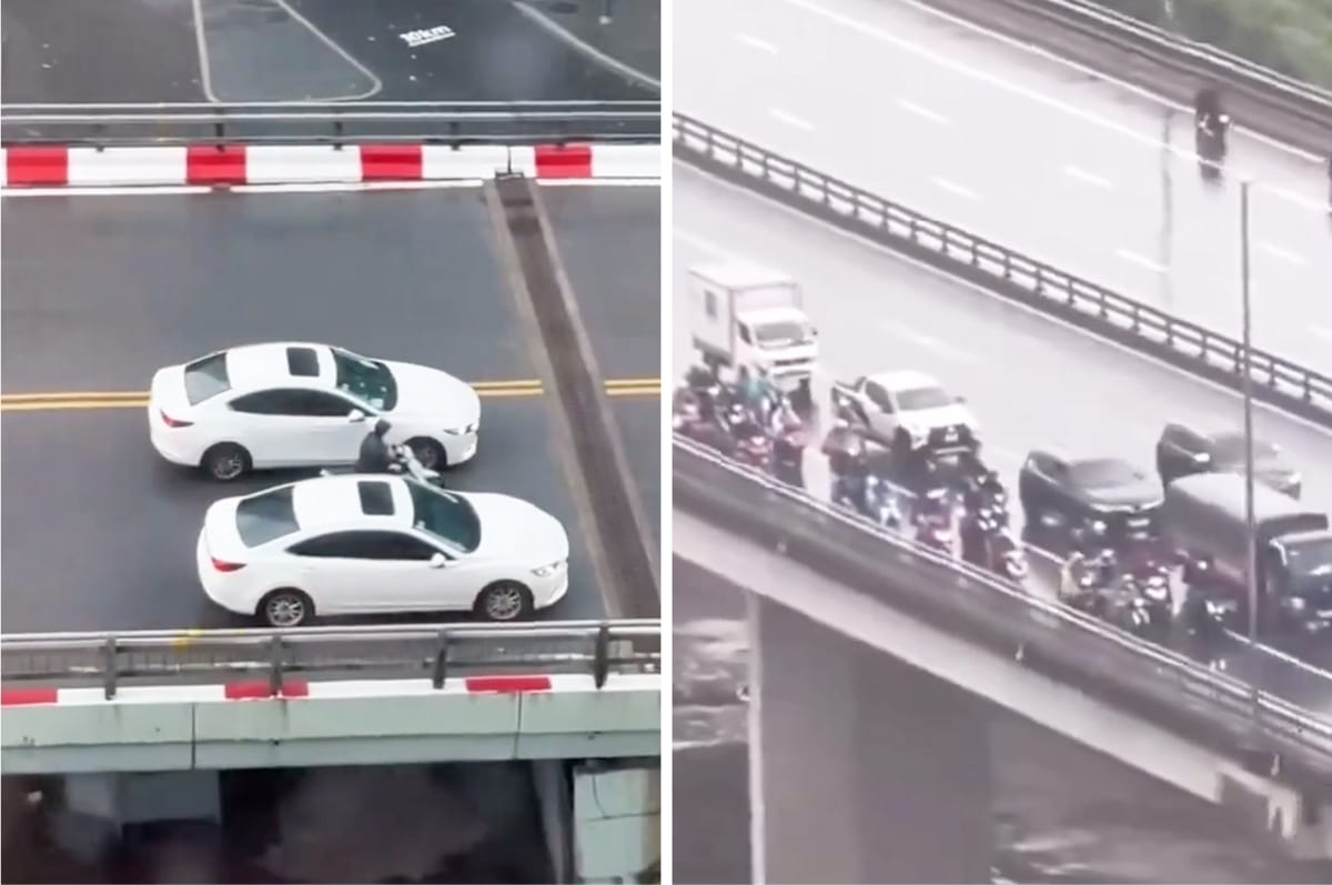 Vietnamese Car Drivers Are Protecting Scooter Drivers From The Wind During A Massive Typhoon