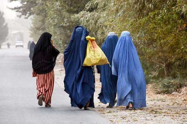 taliban ban women hearing each other afghanistan praying quran