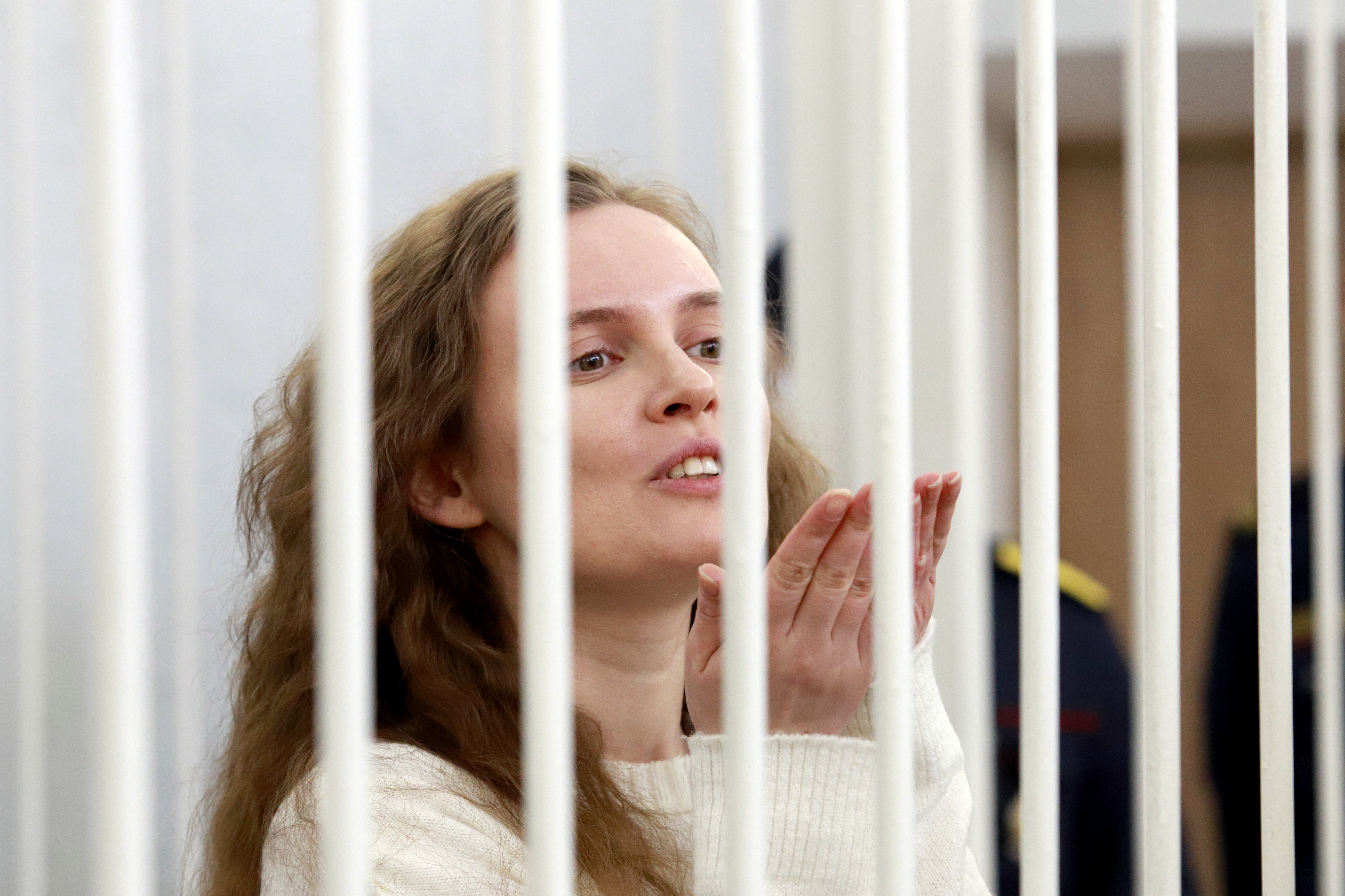 belarus journalists jailed for covering anti-government protests gestures  