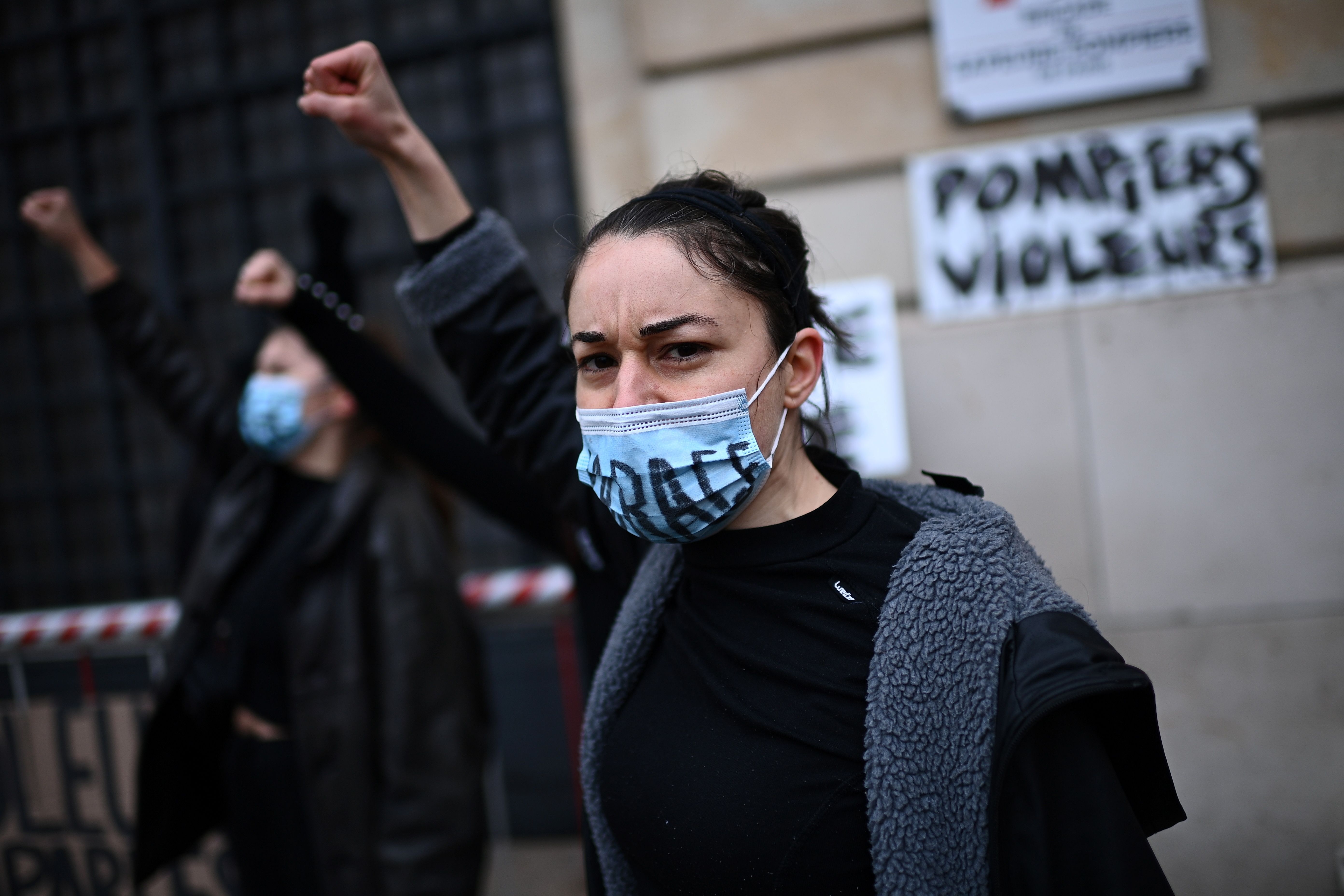 Protesters and members of the feminist movement 'Les Colleuses' gather in front of a fire brigade in Paris to "demand justice for Julie who was raped by 20 firemen" photo.