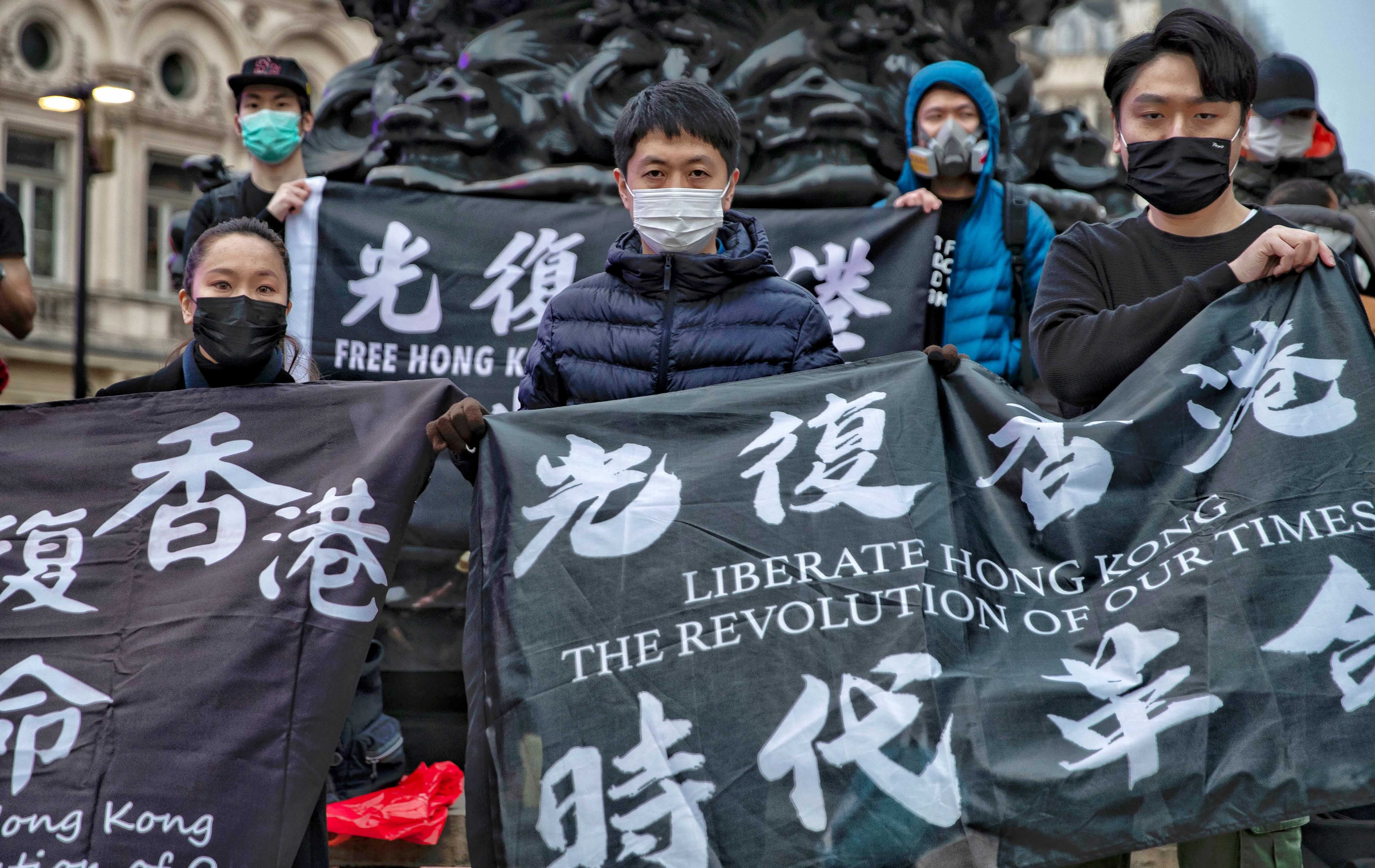 Hong Kong supporters gathered in London to show support for 47 activists charged. 