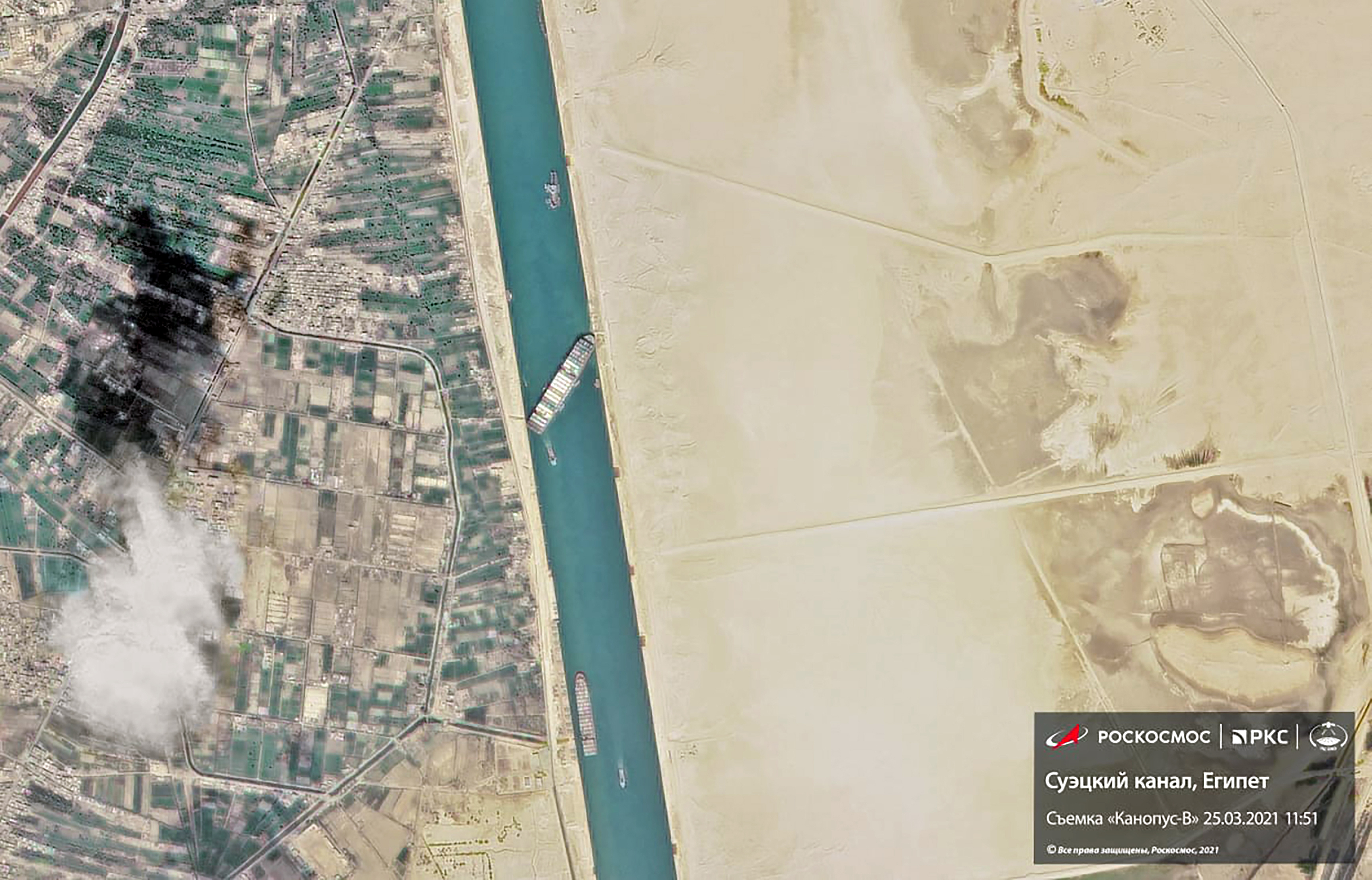 The 400m-long container ship blocked the Suez Canal as it was knocked off course during a sandstorm while en route from China to Rotterdam, Netherlands photo.