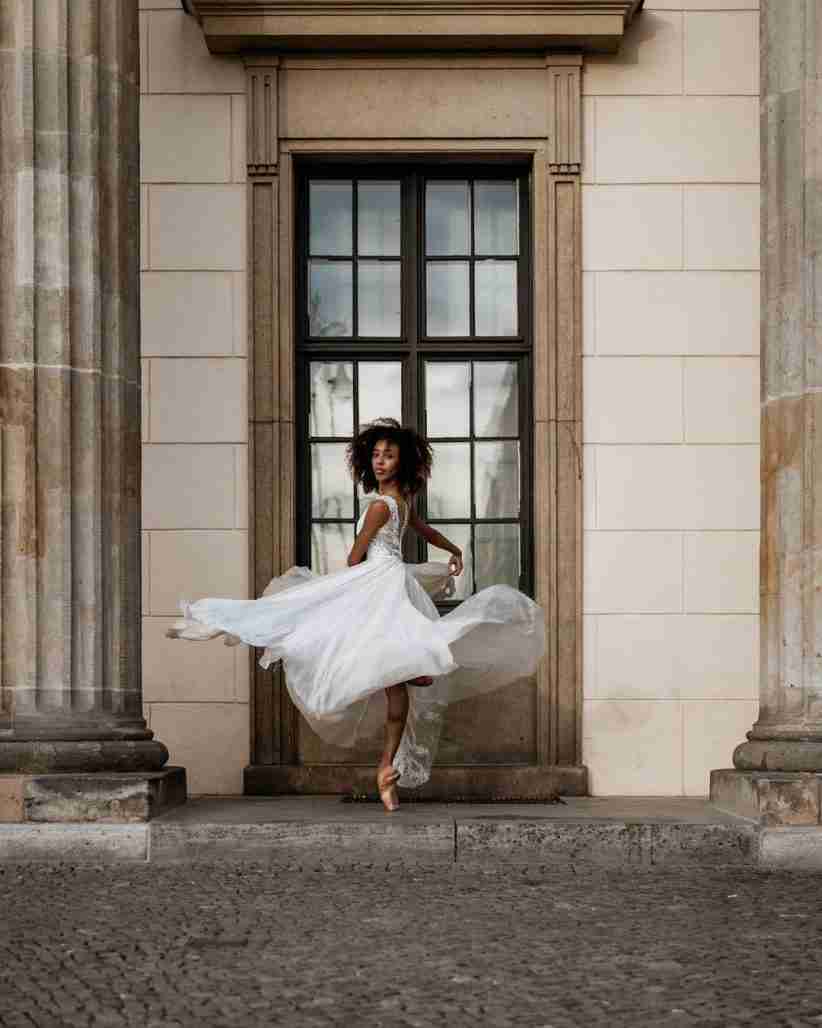 Chloé Lopes Gomes performs ballet in a white dress.