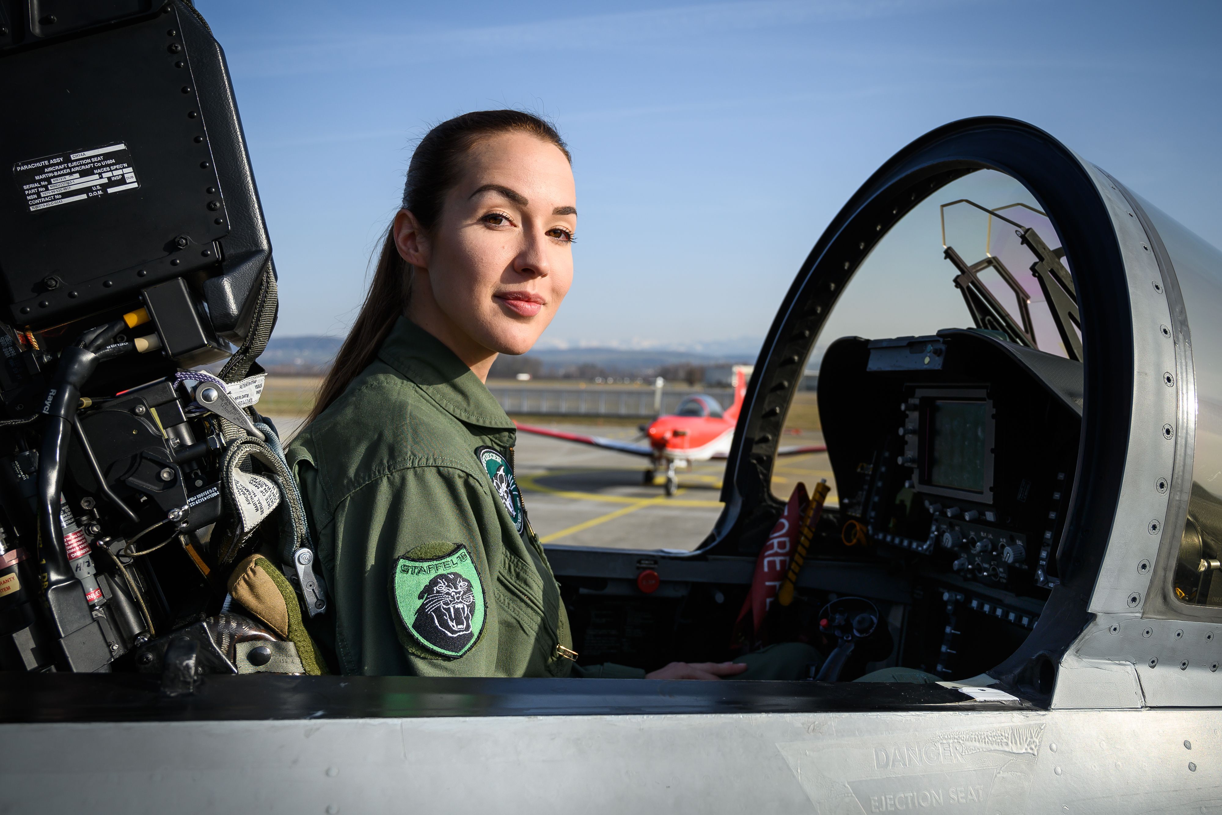 First Lieutenant Fanny Chollet, the first woman to fly an F / A-18 Hornet fighter in Switzerland poses during a press conference at Payerne Air Base photo.