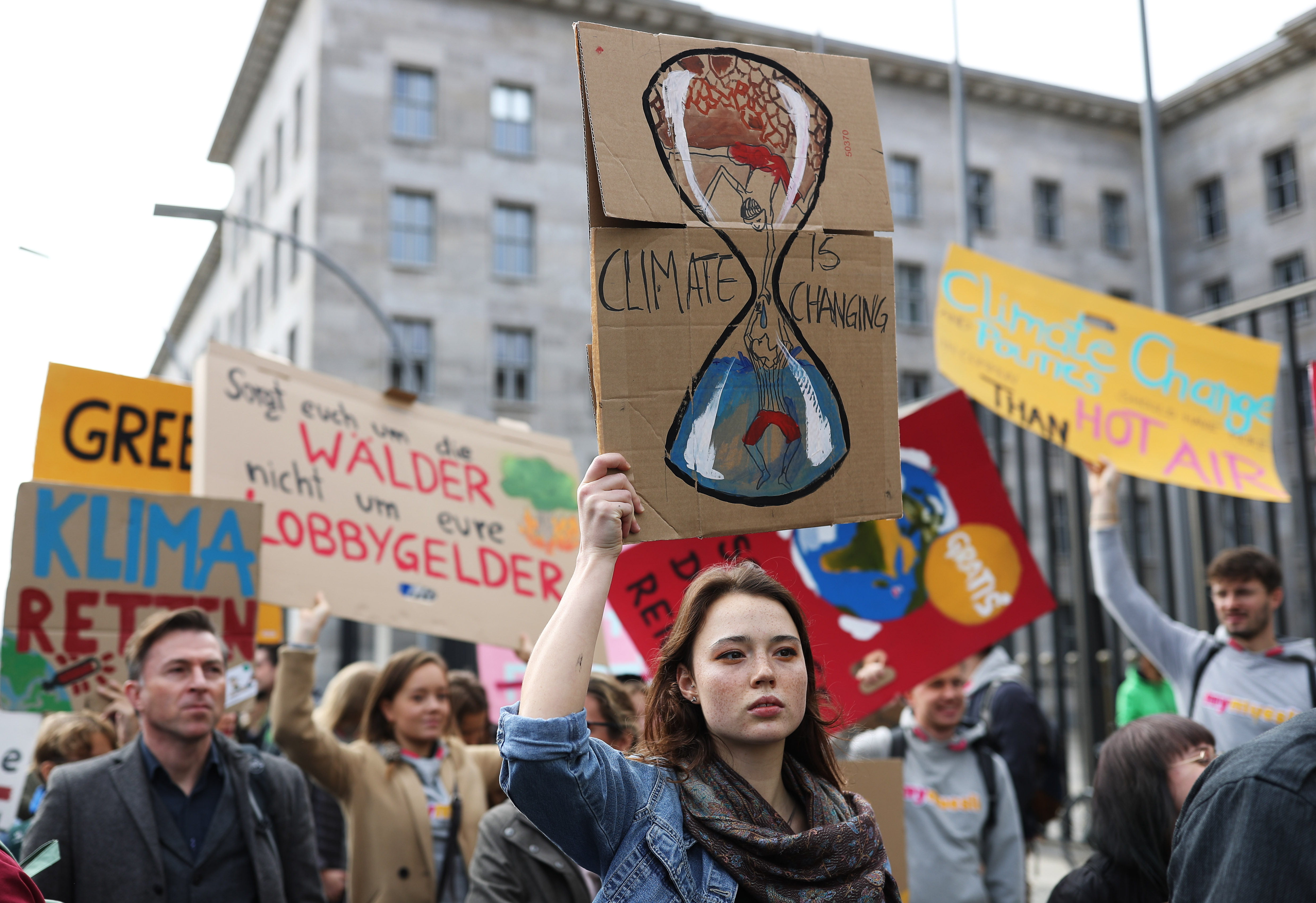 Participants in the Fridays For Future movement protest outside the Federal Ministry of Finance during a nationwide climate change action day in Berlin, Germany.