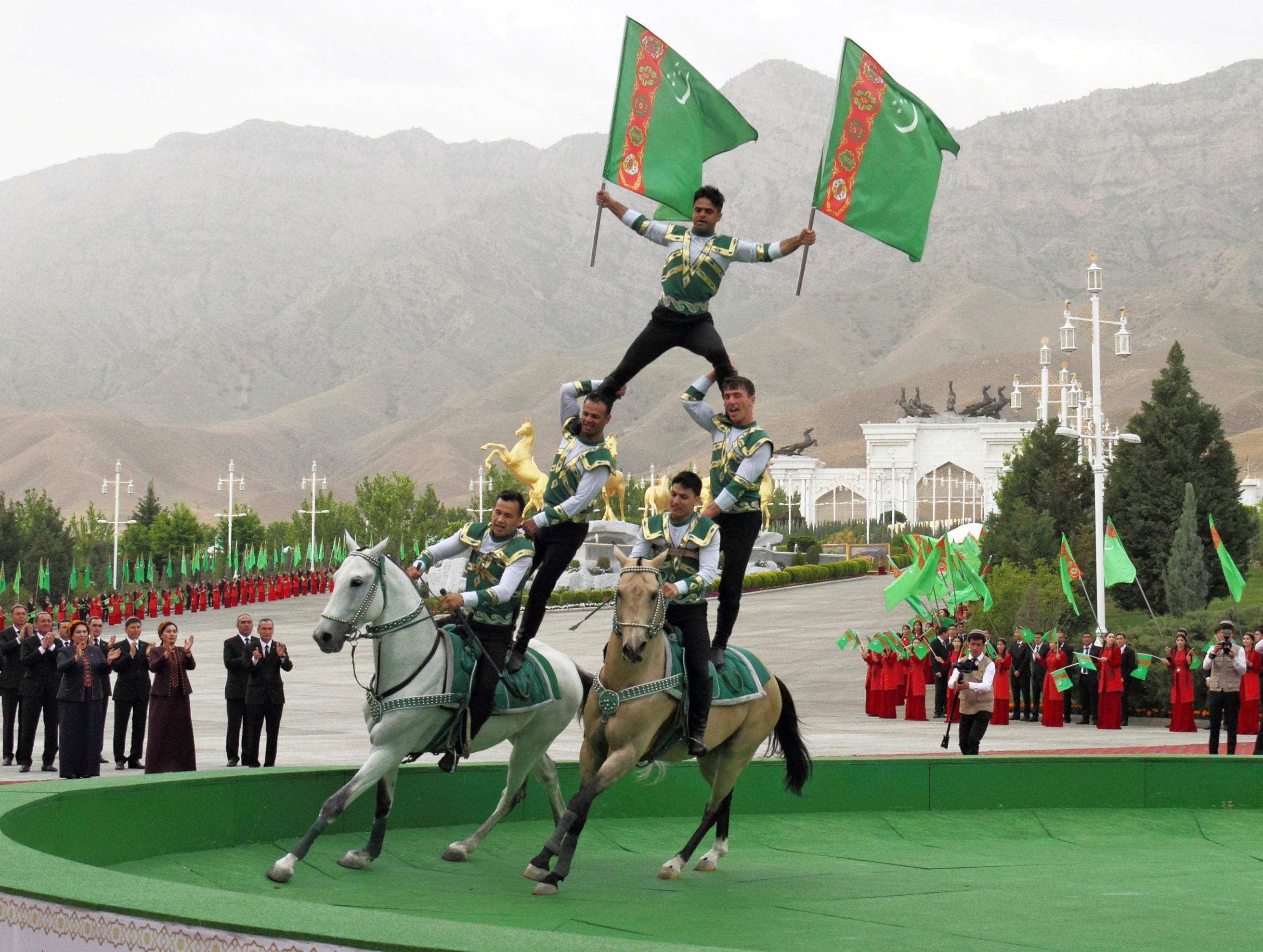 Horsemen perform during celebrations for the national Turkmen Horse Day and the Turkmen Shepherd Dog Day near Ashgabat, Turkmenistan.