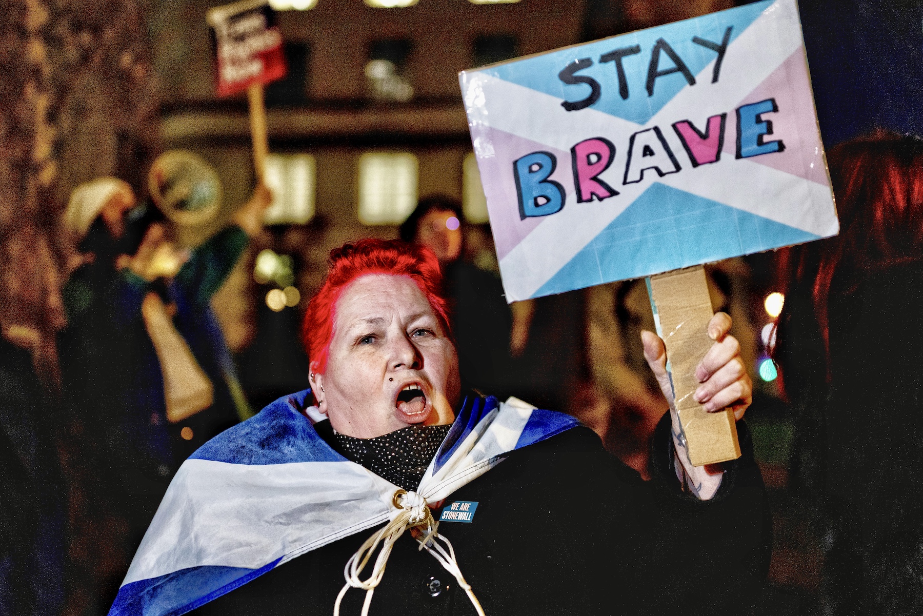 an old lady supporting trans people to stay brave