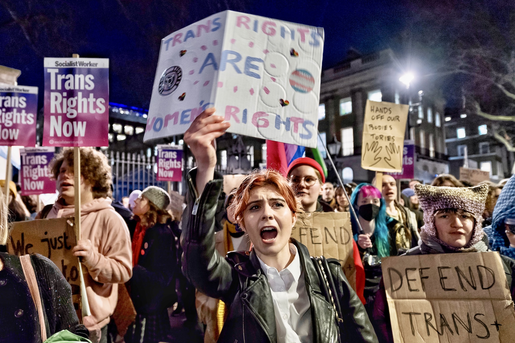 young people protesting against government for trans rights on the street