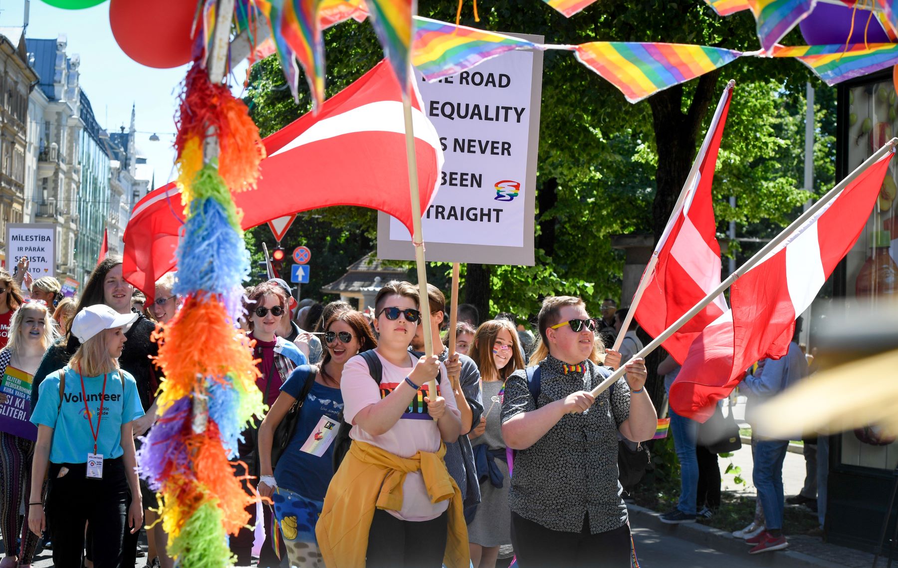 People take part in an LGBTQ demonstration