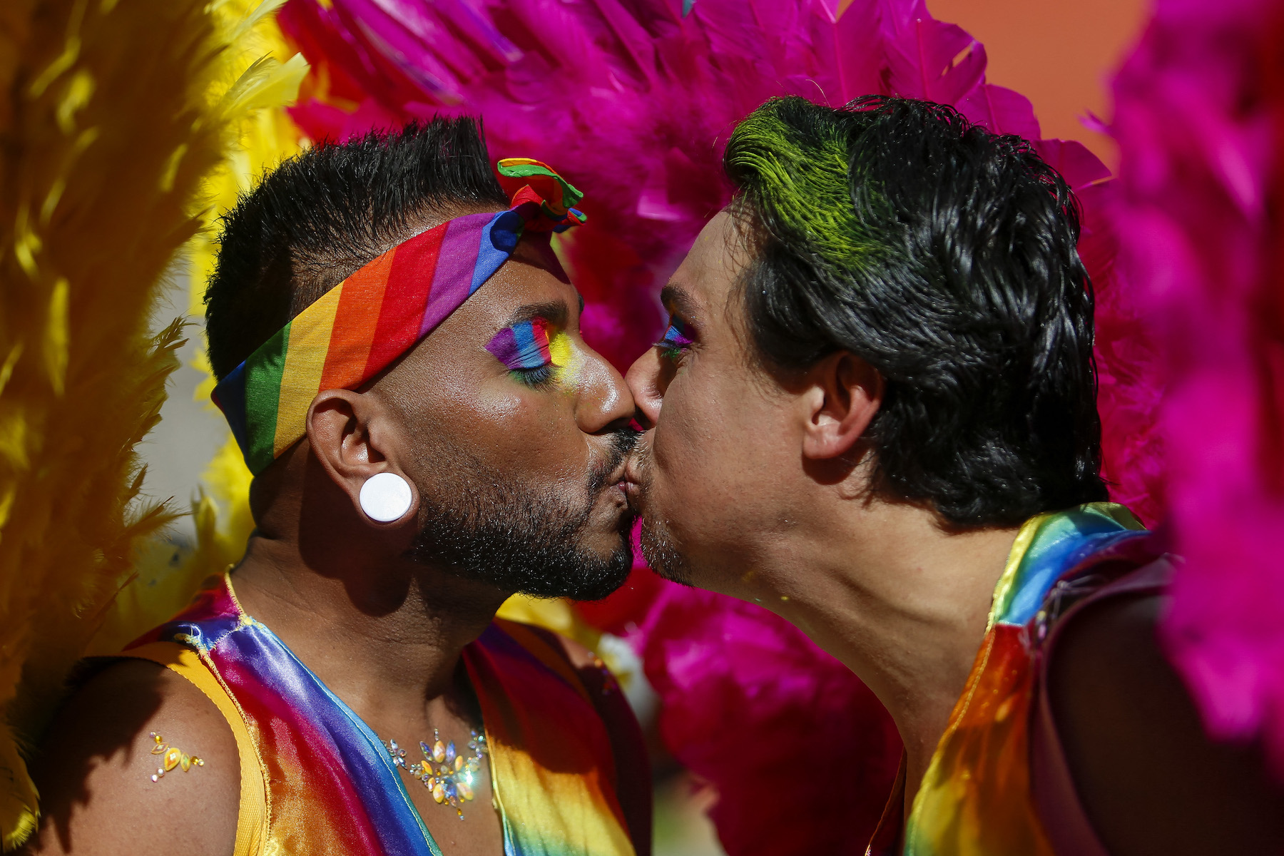 A gay couple kisses during São Paulo's pride parade