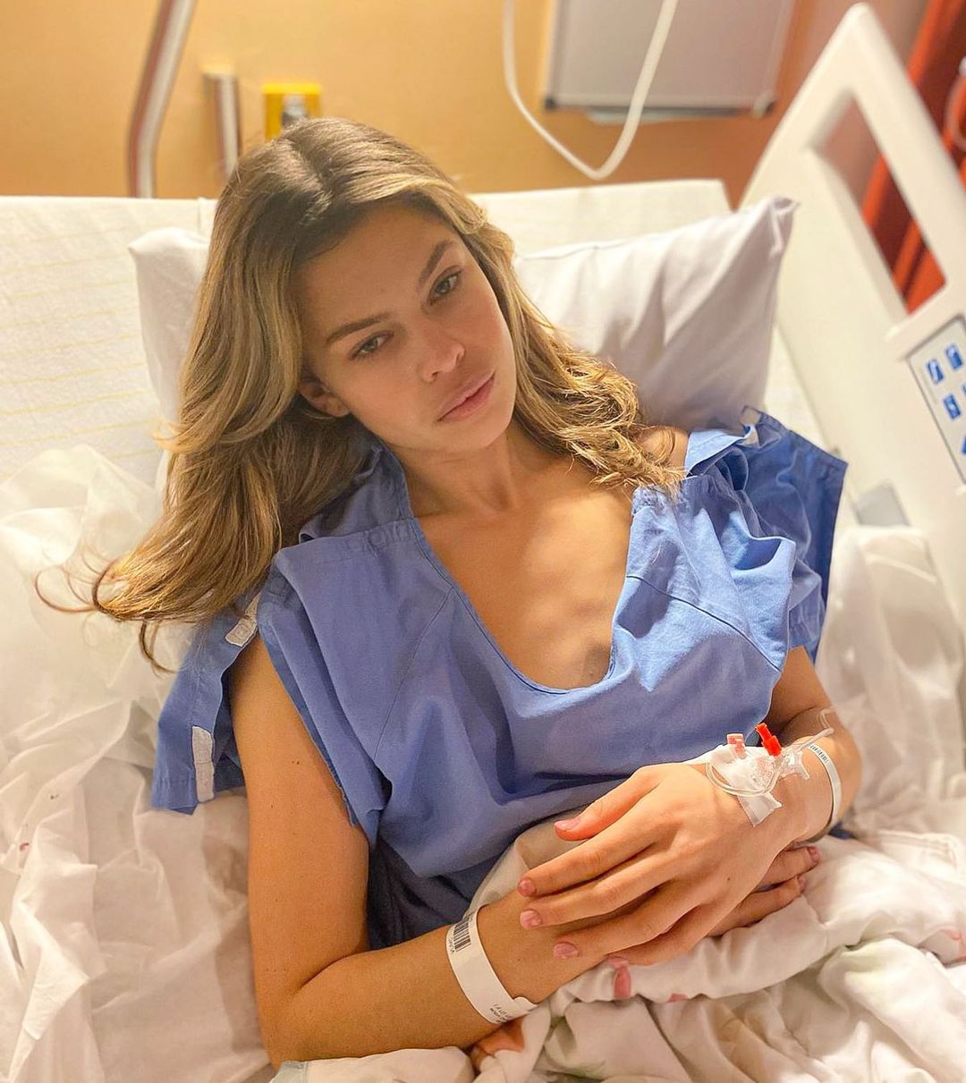 Dutch model and Miss Netherlands, Rikkie Kollé, lays in a hospital bed after transitioning