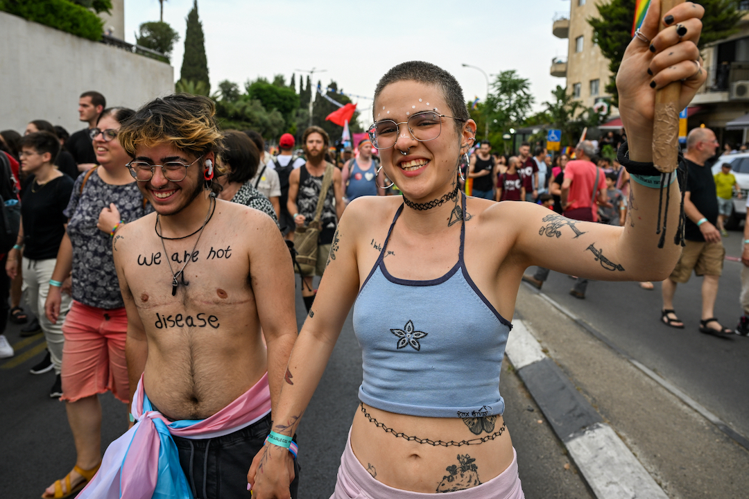 People holding hands at Jerusalem's pride march