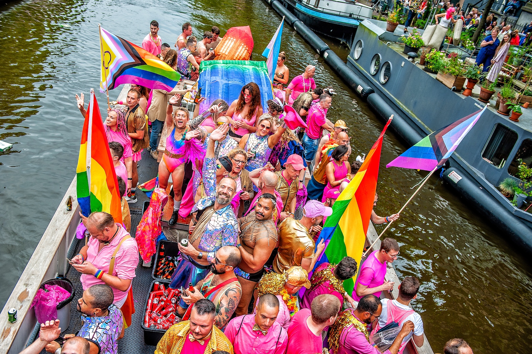 People participate in the canal pride parade in Amsterdam.