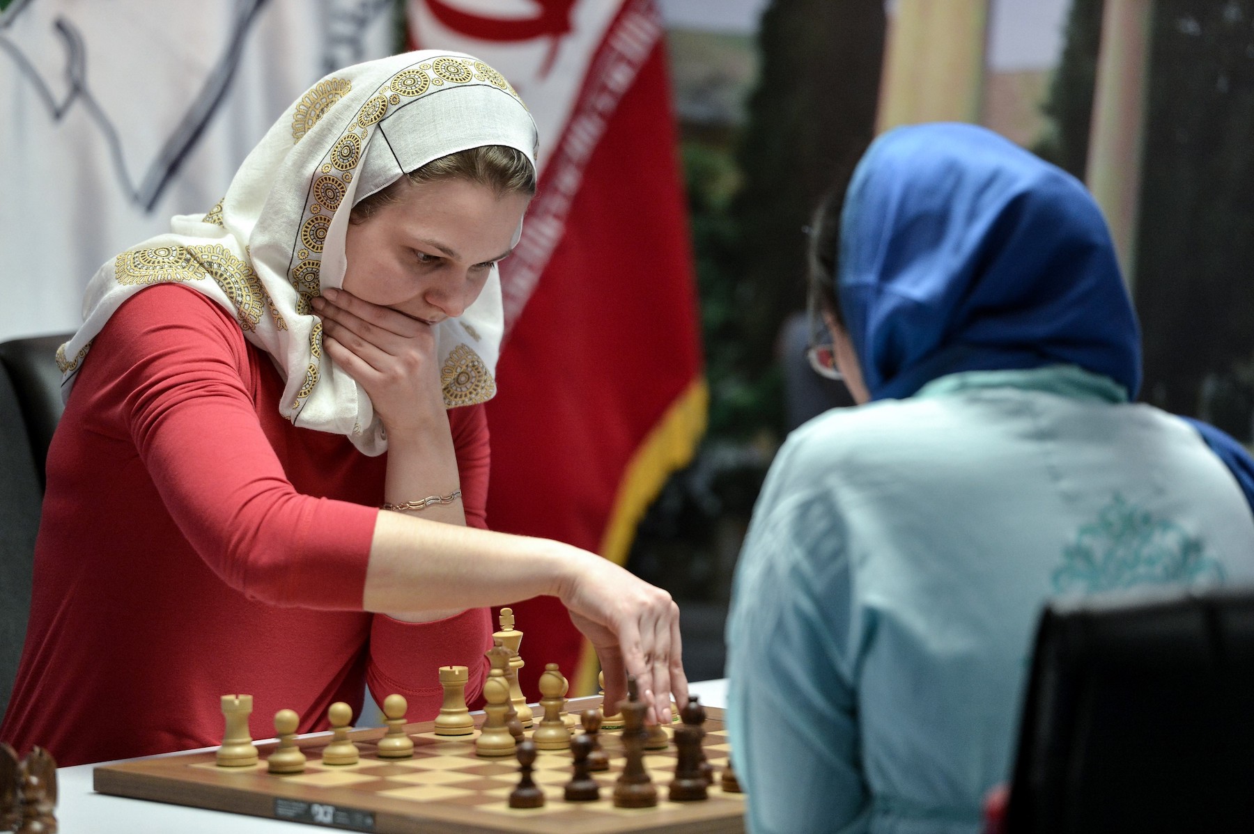 Two chess players playing against each other