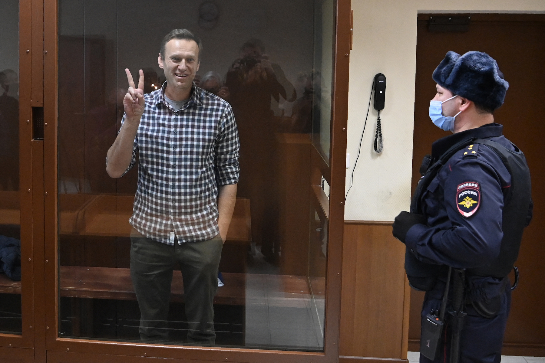 navalny sentencing russia peace sign