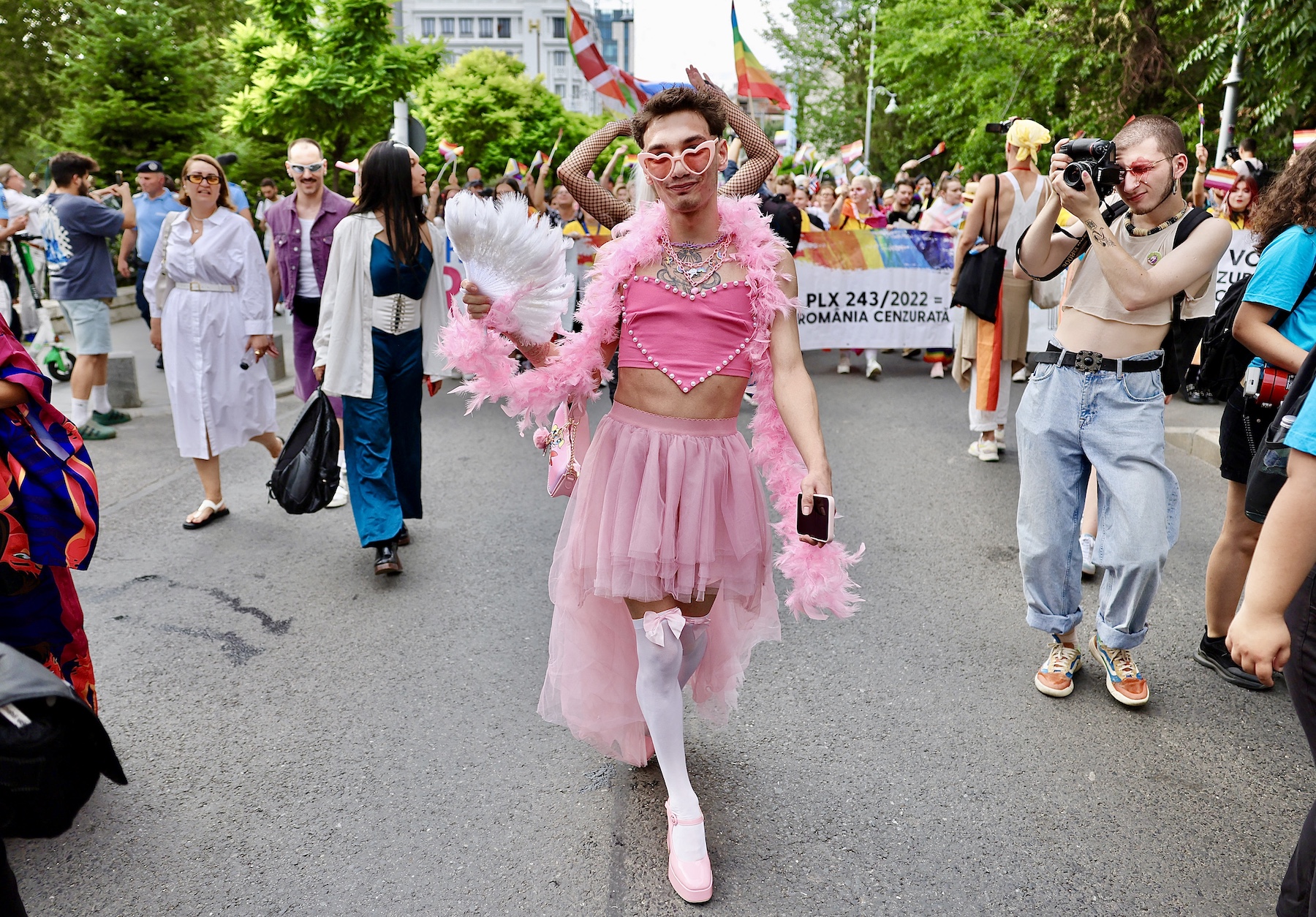 LGBTQ supporter dresses in an all pink outfit