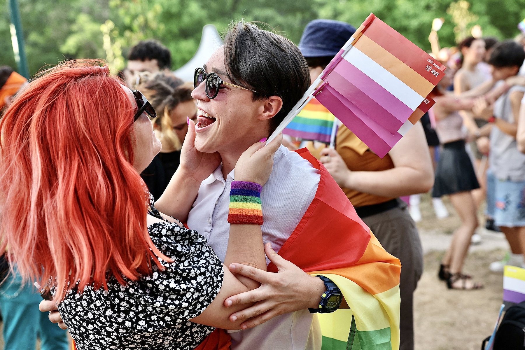 Two people embrace each other at Romania's Pride march 