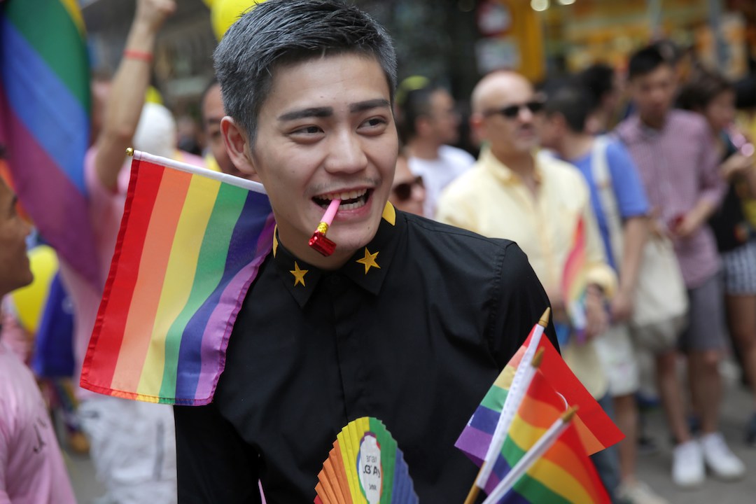 hong kong lgbt pride man rainbow flags