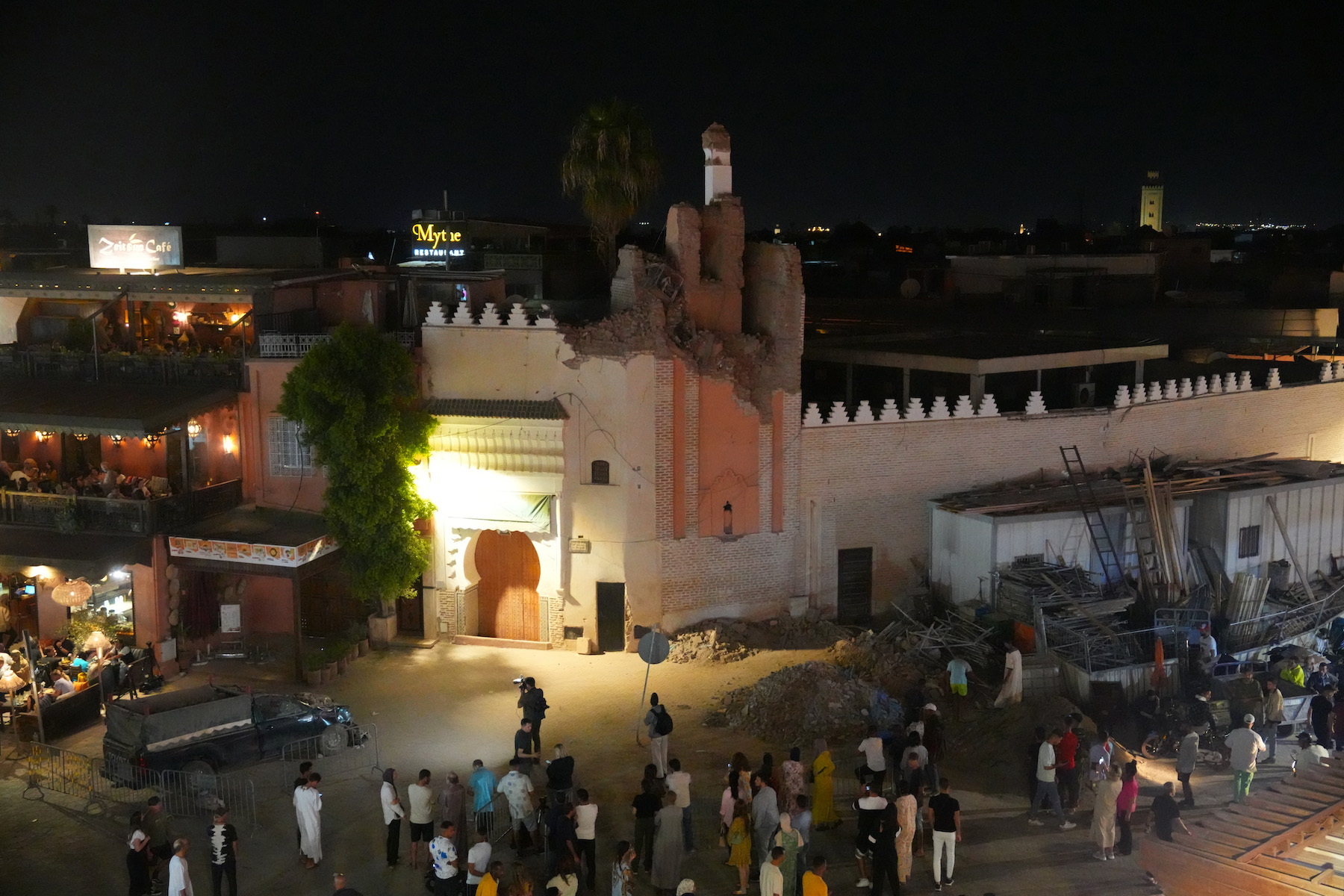 People gather by a damaged mosque morocco earthquake