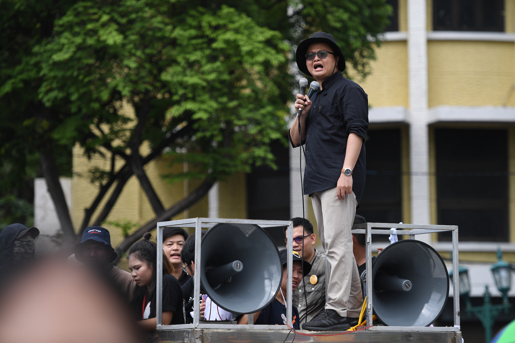 Thailand Human rights lawyer Arnon Nampa speaks to protesters during a protest