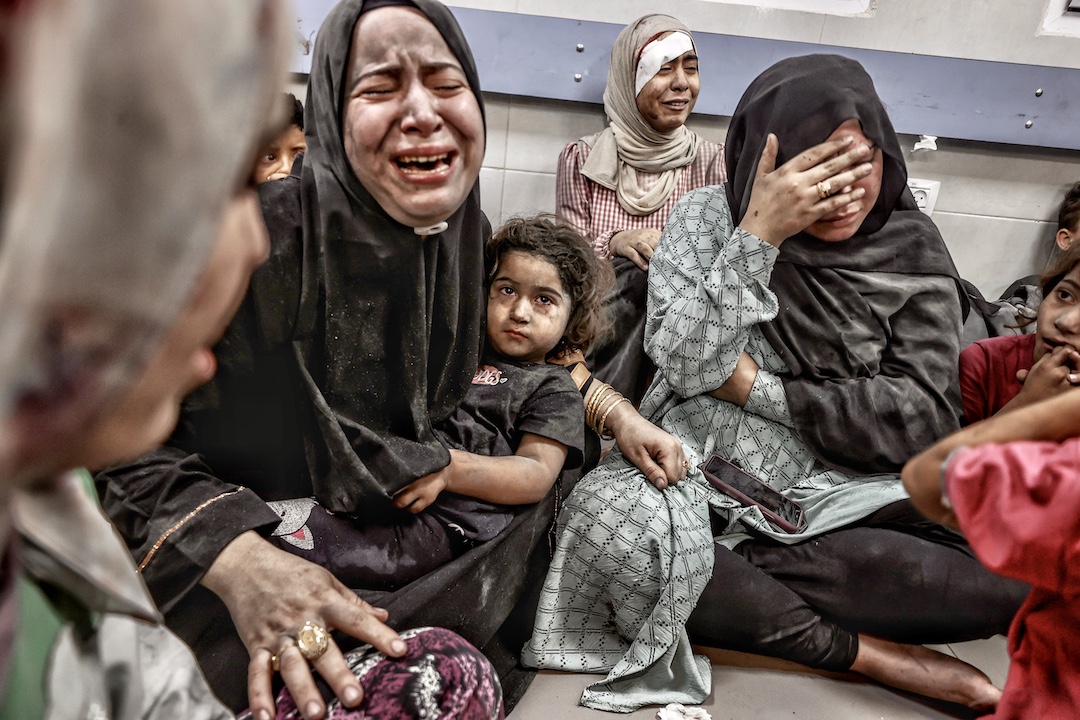 israel bomb gaza hospital civilians cry