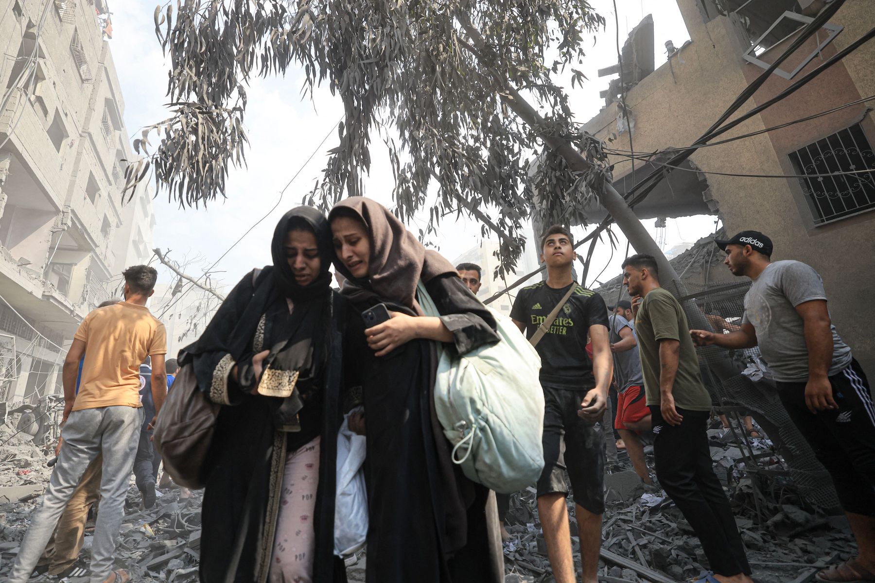 Palestinians evacuated following an Israeli airstrike